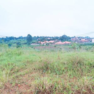 Quick sale!! 1 Acre of prime land in a good neighborhood with ready title in Namugongo only 500metres from tarmac