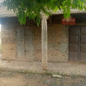 50x100 Land in Hima town council - Near the highway and in busy area - Six rooms - Inside is plastered and floor cemented - Electricity and water available